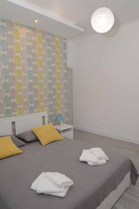 A bed or beds in a room at Casa e Appartamenti per Vacanze Jenner