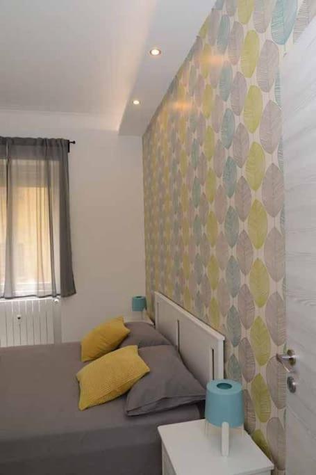 A bed or beds in a room at Casa e Appartamenti per Vacanze Jenner