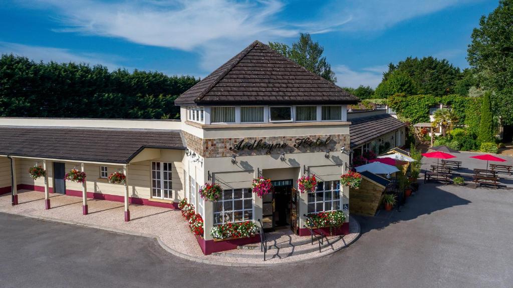 an overhead view of a building with flowers in front at Ardboyne Hotel in Navan