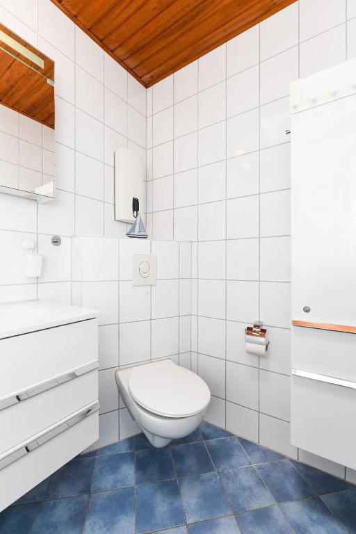 Koupelna v ubytování Ferienhaeuser Nordseebrise
