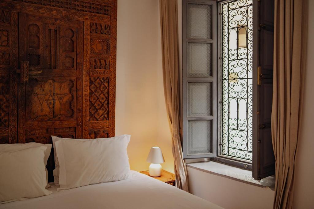 Postel nebo postele na pokoji v ubytování Outsite Marrakesh