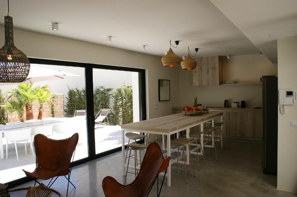A kitchen or kitchenette at Extravagant Ibiza Villa Casa Tranquila Sargamassa 5 Bedrooms Fantastic Sea Views Private Pool Santa Eulalia