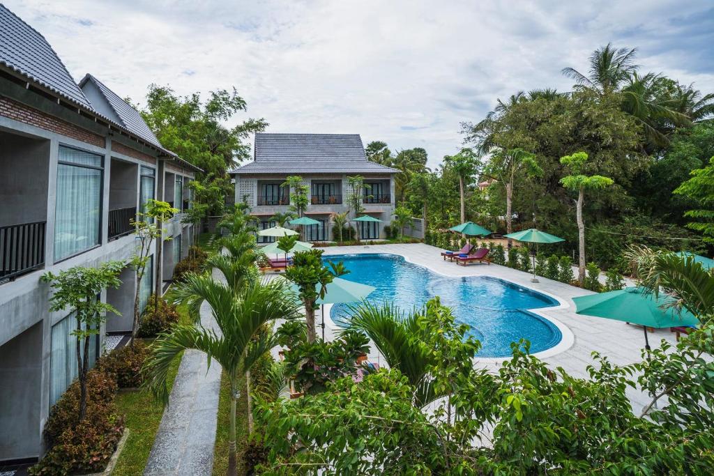 an aerial view of a swimming pool at a house at Kampot Sweet Boutique in Kampot