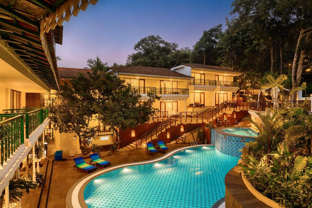 an image of a hotel with a swimming pool at Storii By ITC Hotels, Shanti Morada Goa in Calangute