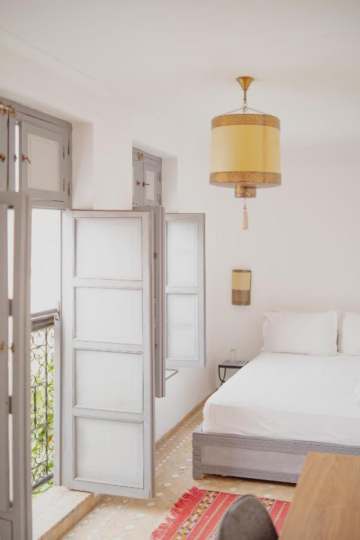 Postel nebo postele na pokoji v ubytování Outsite Marrakesh
