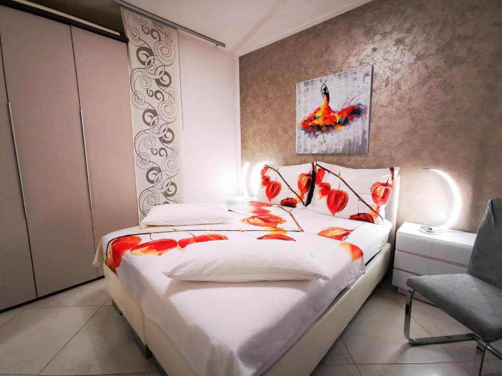 Łóżko lub łóżka w pokoju w obiekcie Apartments Petar Pan