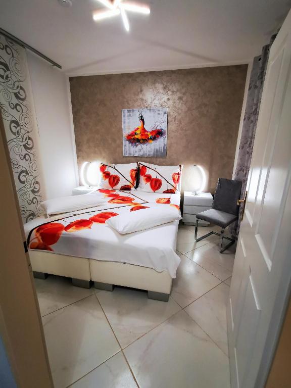 Łóżko lub łóżka w pokoju w obiekcie Apartments Petar Pan