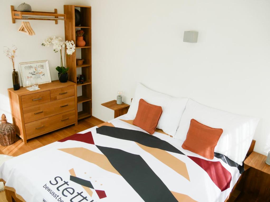 Postel nebo postele na pokoji v ubytování stettli resort