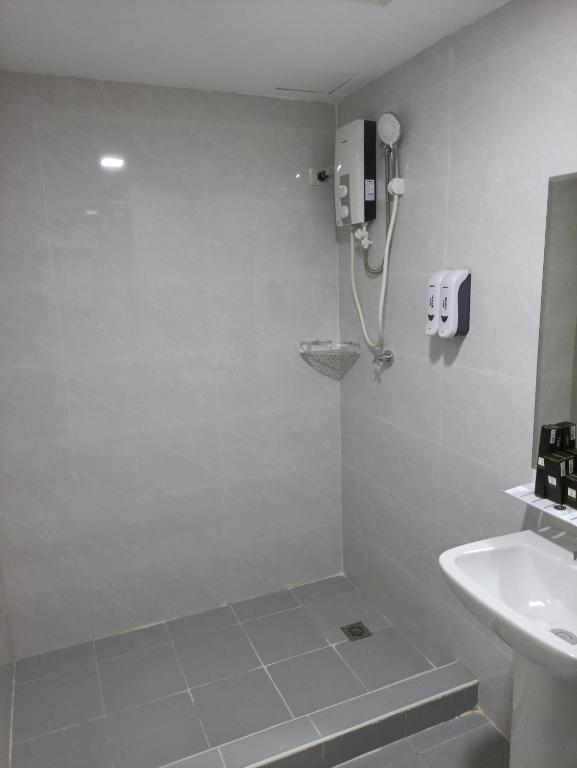 Koupelna v ubytování 广东大酒店Guangdon Business Hotel-SM Mall of Asia, SMX & Manila World Trade Center