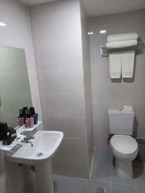 Koupelna v ubytování 广东大酒店Guangdon Business Hotel-SM Mall of Asia, SMX & Manila World Trade Center
