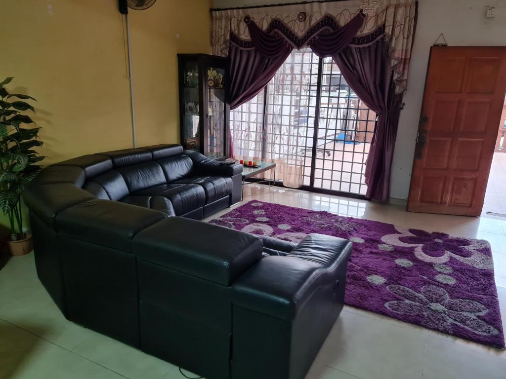 Posezení v ubytování Homestay Haizal Dataran Segar Haizal Guest House