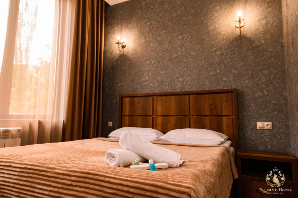 Postel nebo postele na pokoji v ubytování Palermo Hotel