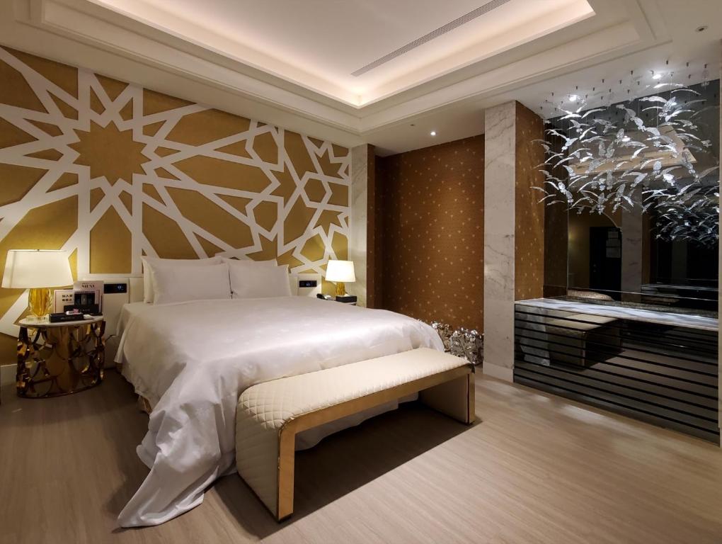 Postel nebo postele na pokoji v ubytování Domo Hotel