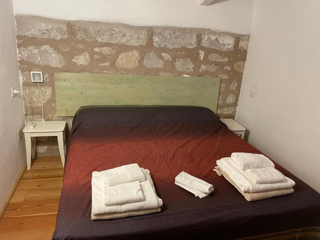 Postel nebo postele na pokoji v ubytování Residenza A Cova