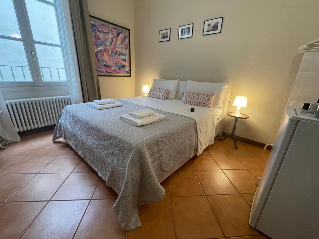 Postel nebo postele na pokoji v ubytování La camera di Lidia