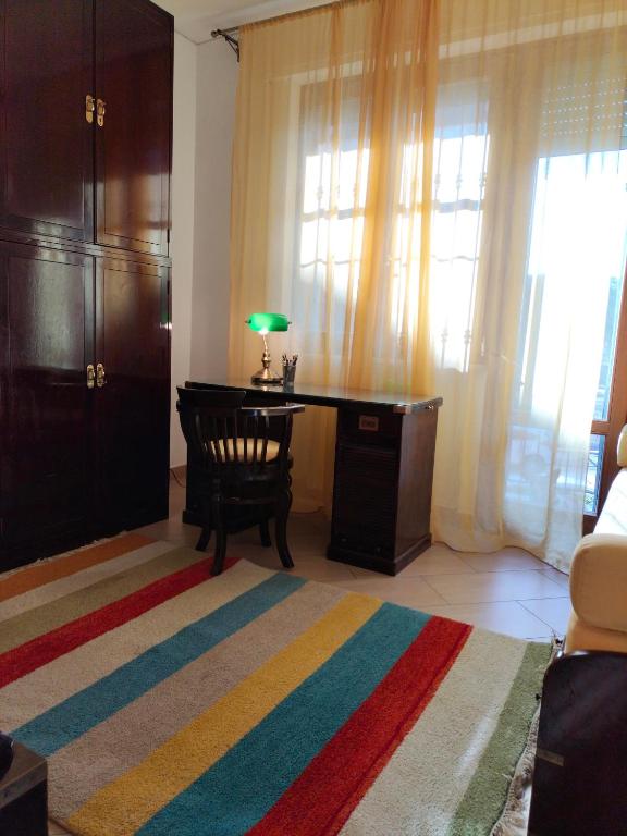 Кровать или кровати в номере Sunnyside Accademia