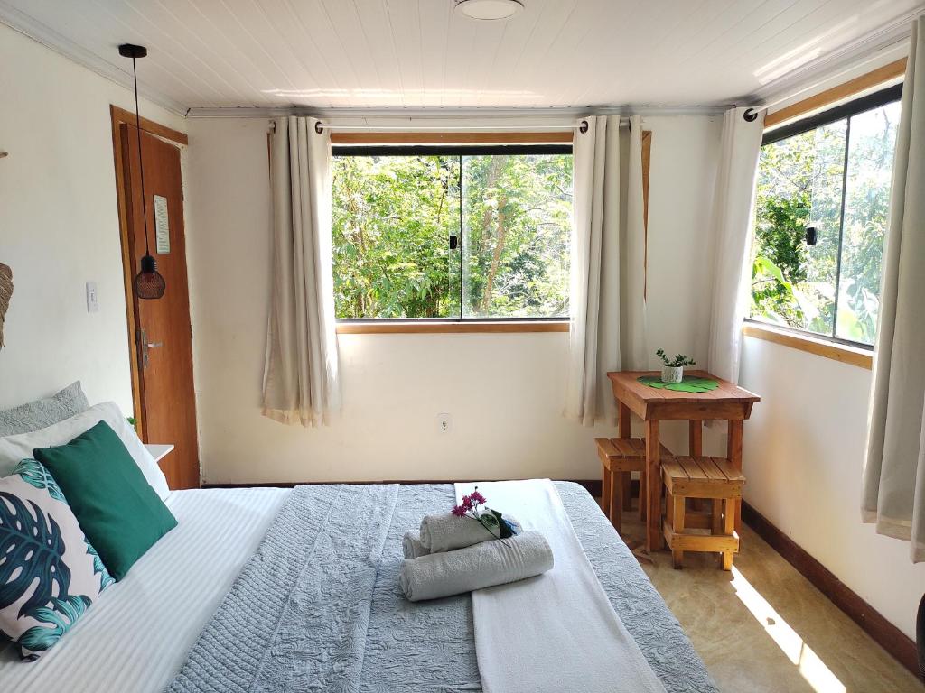 Postel nebo postele na pokoji v ubytování Suites casa do indio jungle, a melhor vista da floresta