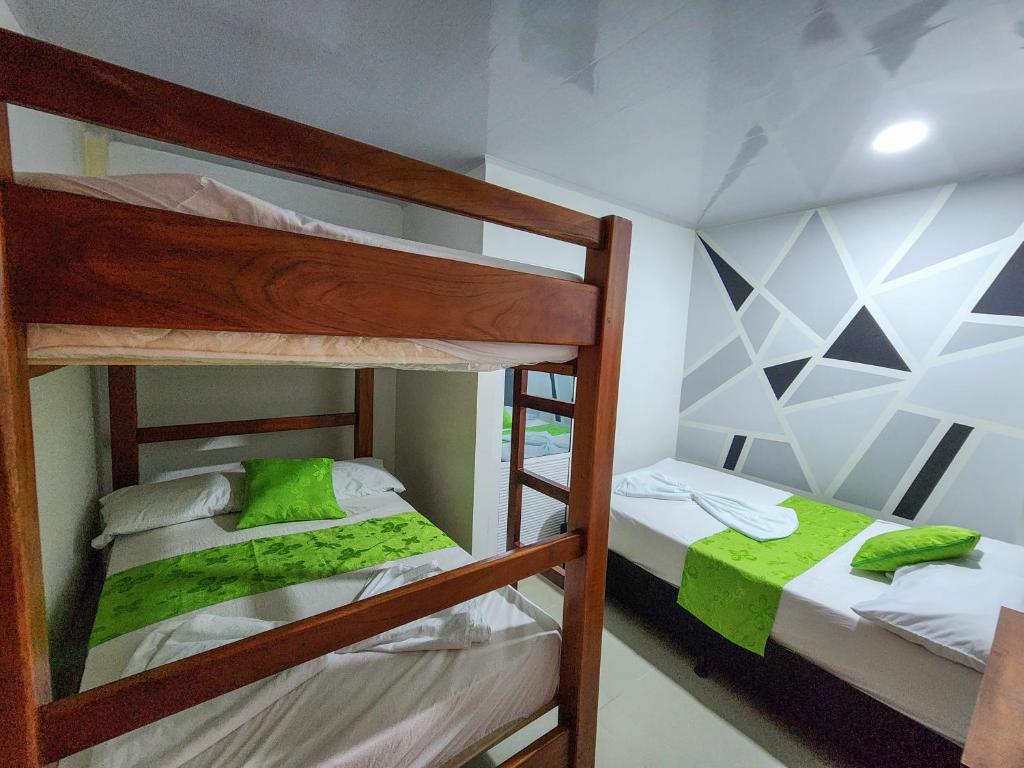 Postel nebo postele na pokoji v ubytování MIRADORES DEL PARAISO