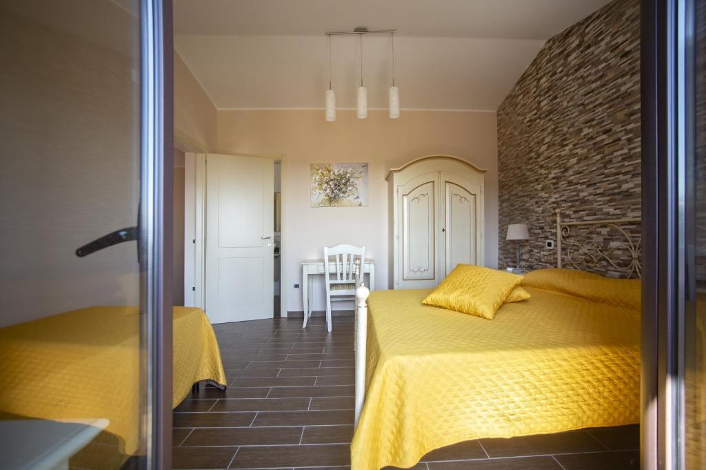 Posteľ alebo postele v izbe v ubytovaní B&B MALVETUM