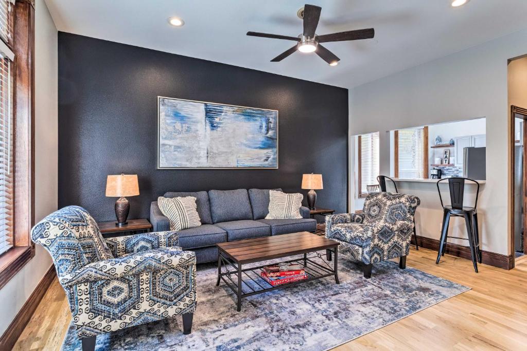 a living room with a couch and two chairs at Updated Denver Townhome Less Than 1 Mi to St Josephs in Denver