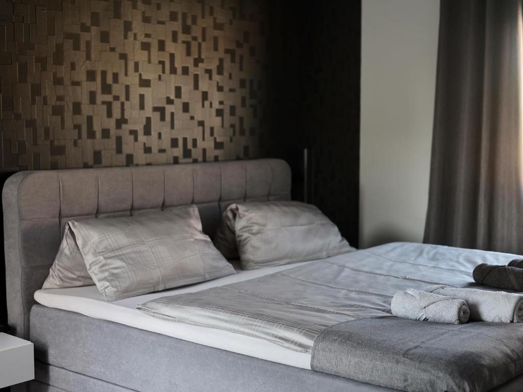 Łóżko lub łóżka w pokoju w obiekcie Villa Mila