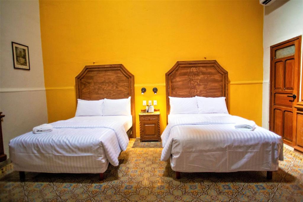 Postel nebo postele na pokoji v ubytování Hotel Real Toledo by Kavia