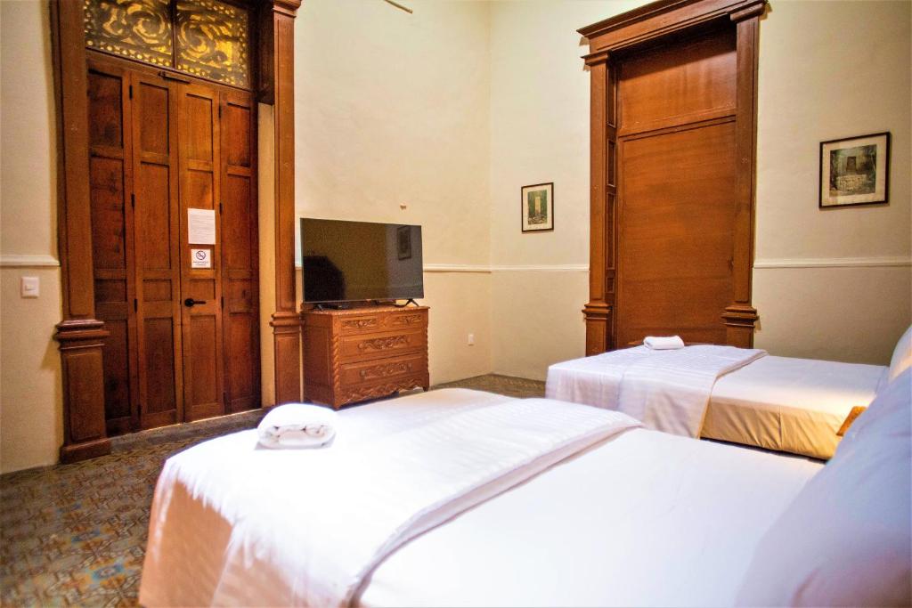 TV a/nebo společenská místnost v ubytování Hotel Real Toledo by Kavia