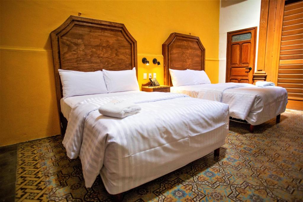 Postel nebo postele na pokoji v ubytování Hotel Real Toledo by Kavia