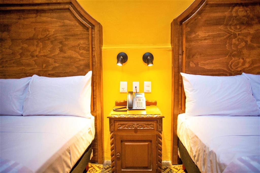 Postel nebo postele na pokoji v ubytování Hotel Real Toledo by Kavia