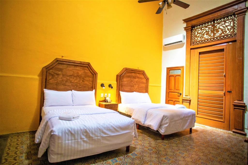 Postel nebo postele na pokoji v ubytování Hotel Real Toledo by Kavia