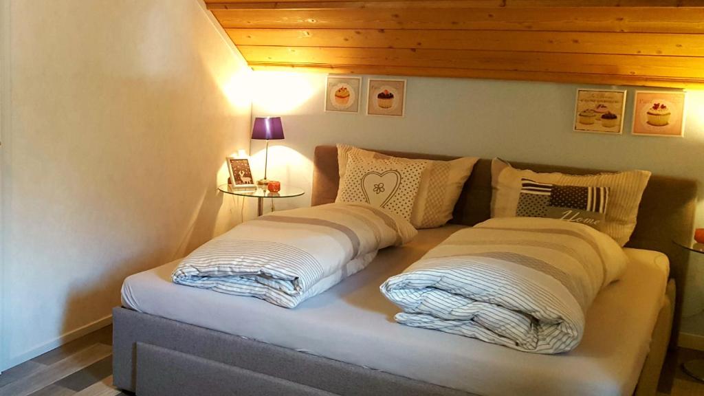 Postel nebo postele na pokoji v ubytování Hotel Gasthof Gaistal