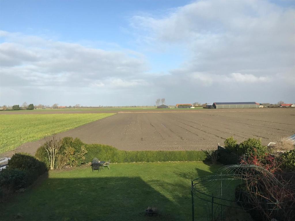 T Huuske tuinappartement met fantastisch uitzicht, nabij Zee - Appartamento Con Una Camera Da Letto