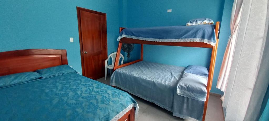 Postel nebo postele na pokoji v ubytování Villas Karen