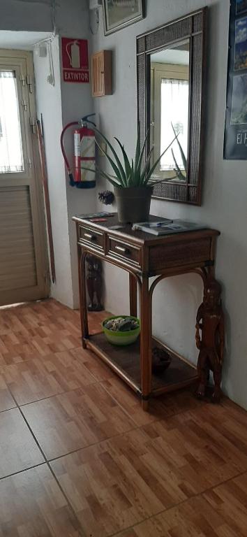 Televízia a/alebo spoločenská miestnosť v ubytovaní Vivienda Vacacional Sabinosa