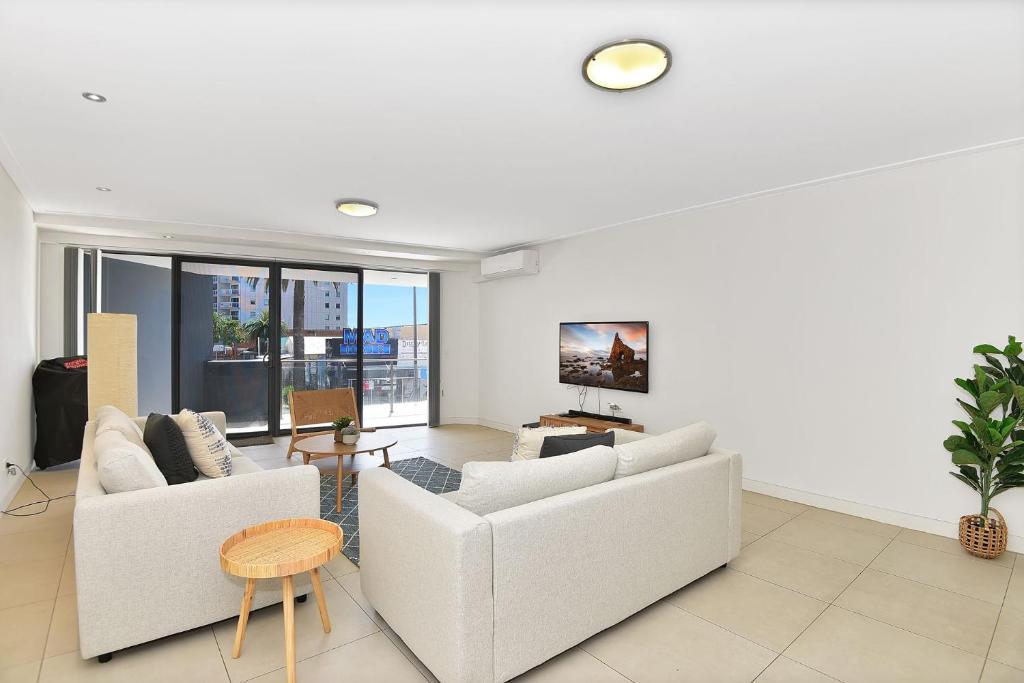 TV a/nebo společenská místnost v ubytování Coast Apartments 7