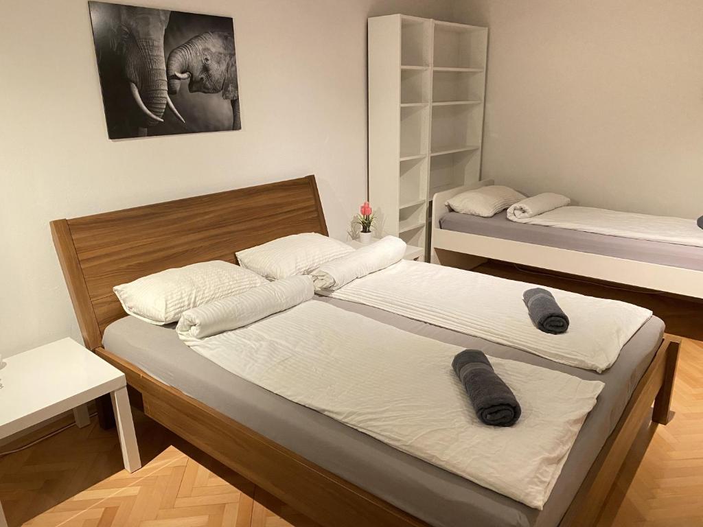Postel nebo postele na pokoji v ubytování Villa pod Gradom