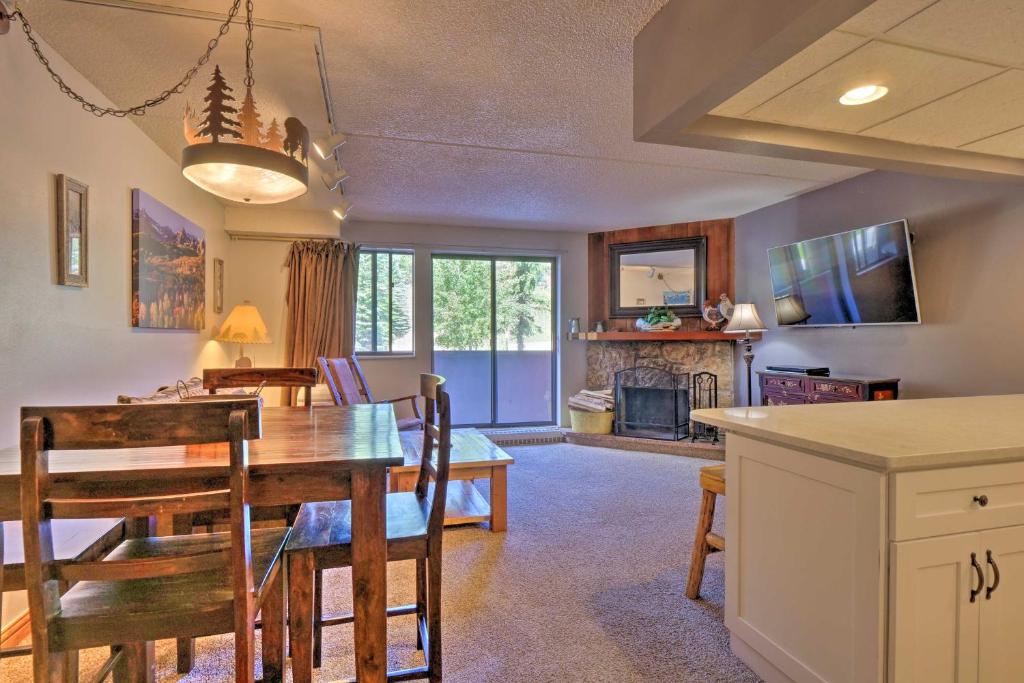a kitchen and dining room with a table and chairs at Beaver Run 1 Bedroom Condo in Breckenridge