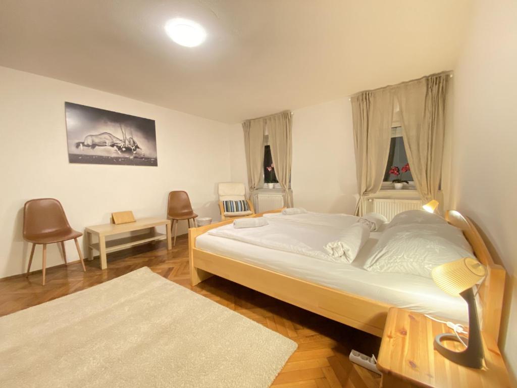 Postel nebo postele na pokoji v ubytování Villa pod Gradom