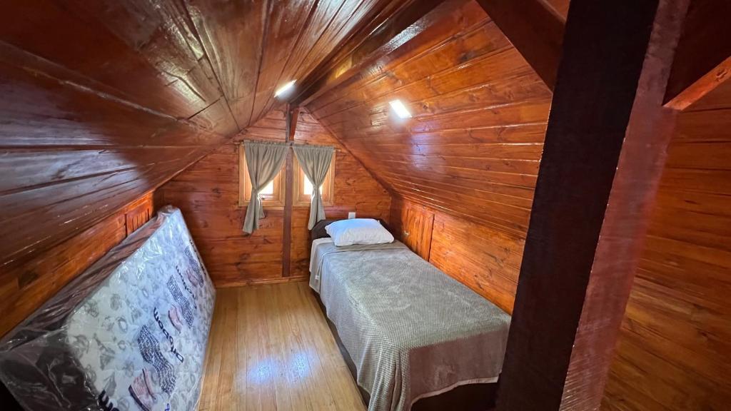 Postel nebo postele na pokoji v ubytování Chalés da Cascata - Pitanga