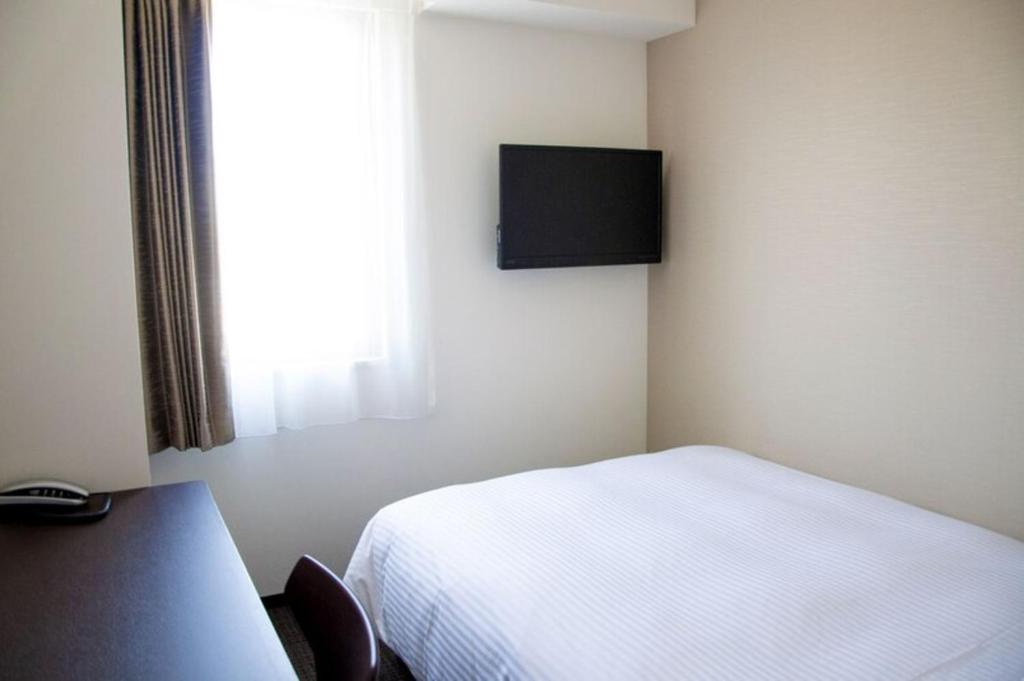 TV a/nebo společenská místnost v ubytování HOTEL GLAN Y's KUMAGAYAEKIMAE premier