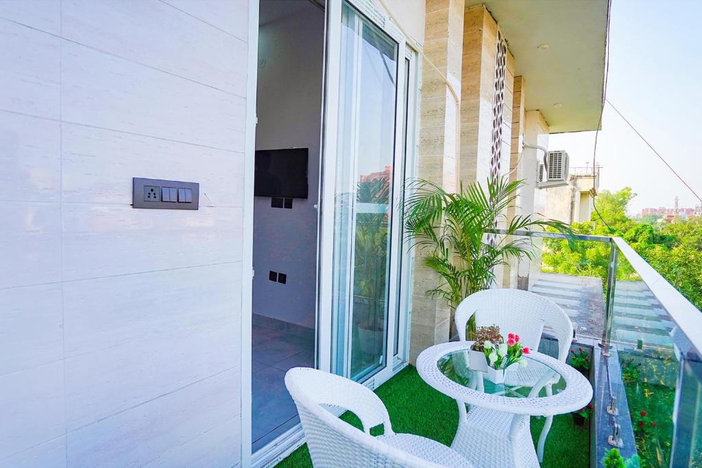 Balkón nebo terasa v ubytování FabHotel Sunrise Sector 56