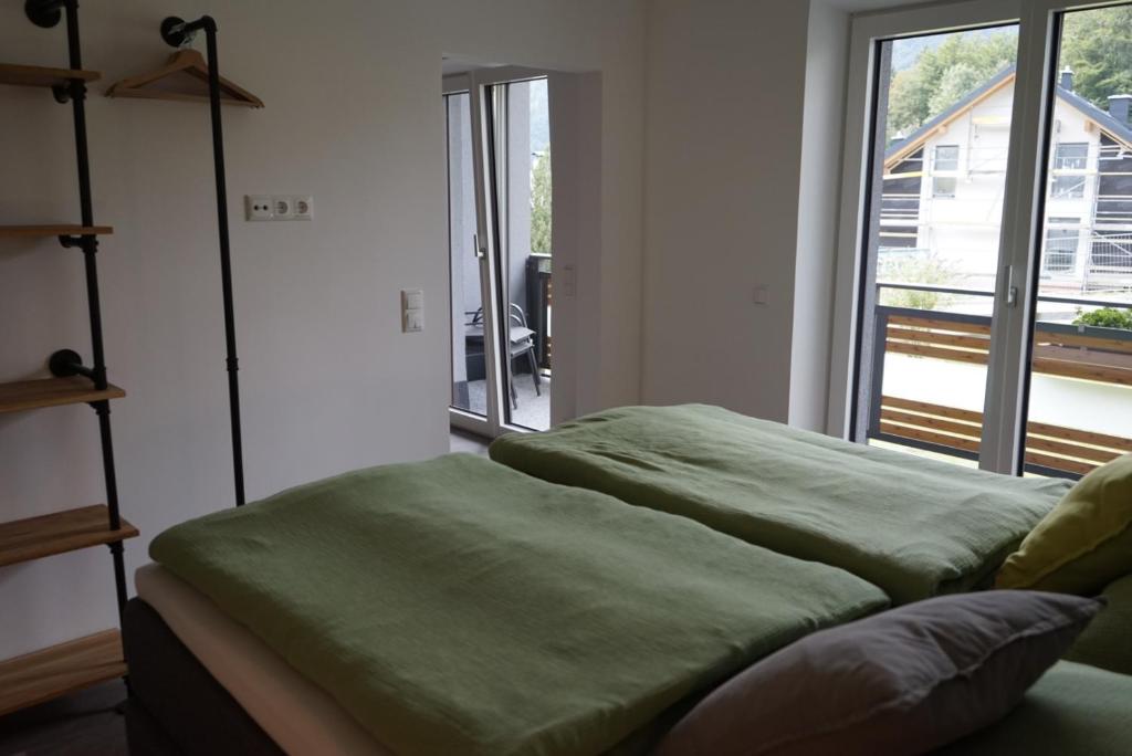 Postel nebo postele na pokoji v ubytování Seeblick Homes