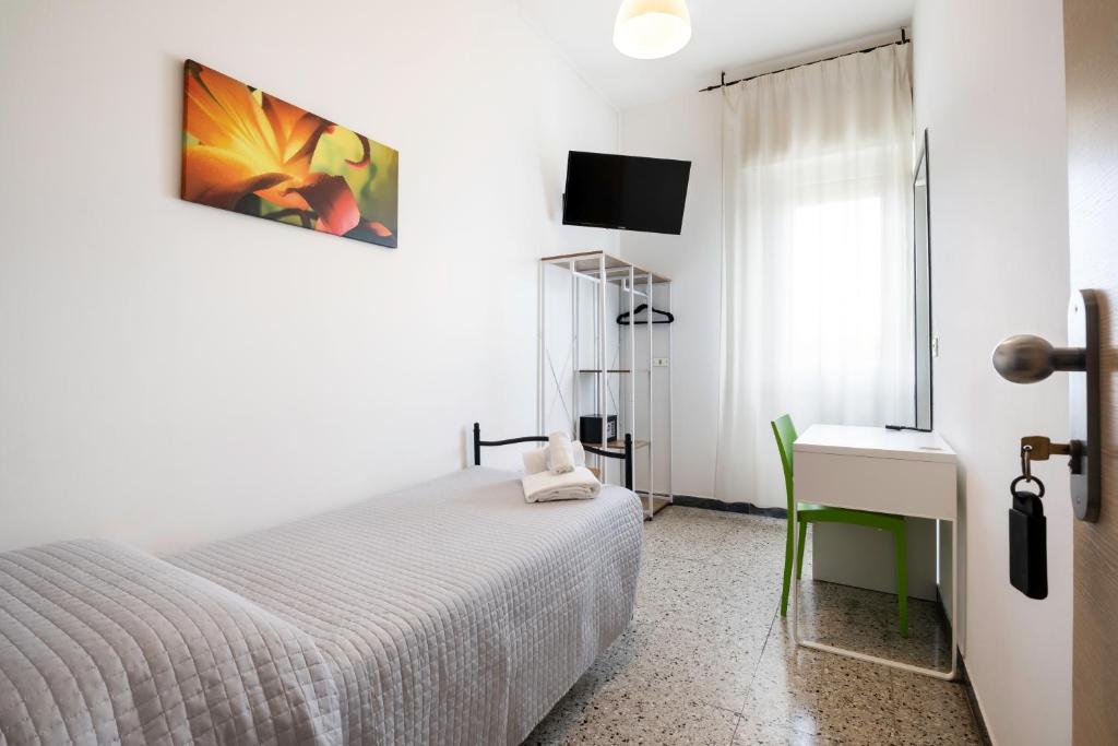 Posteľ alebo postele v izbe v ubytovaní Hotel Ausonia B&B RiMiNi