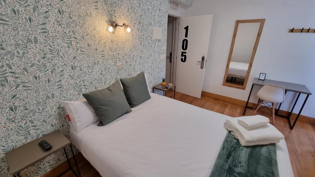 Postel nebo postele na pokoji v ubytování Hotel Norte