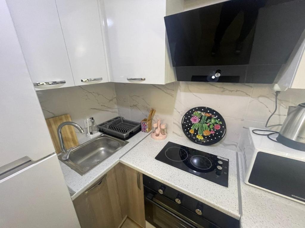 Kuchyň nebo kuchyňský kout v ubytování King Suite TH28