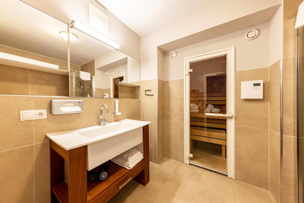 der Sonnberg Alpinlodges - Apartments mit Seeblick, privater Sauna und Self Check-In - 9