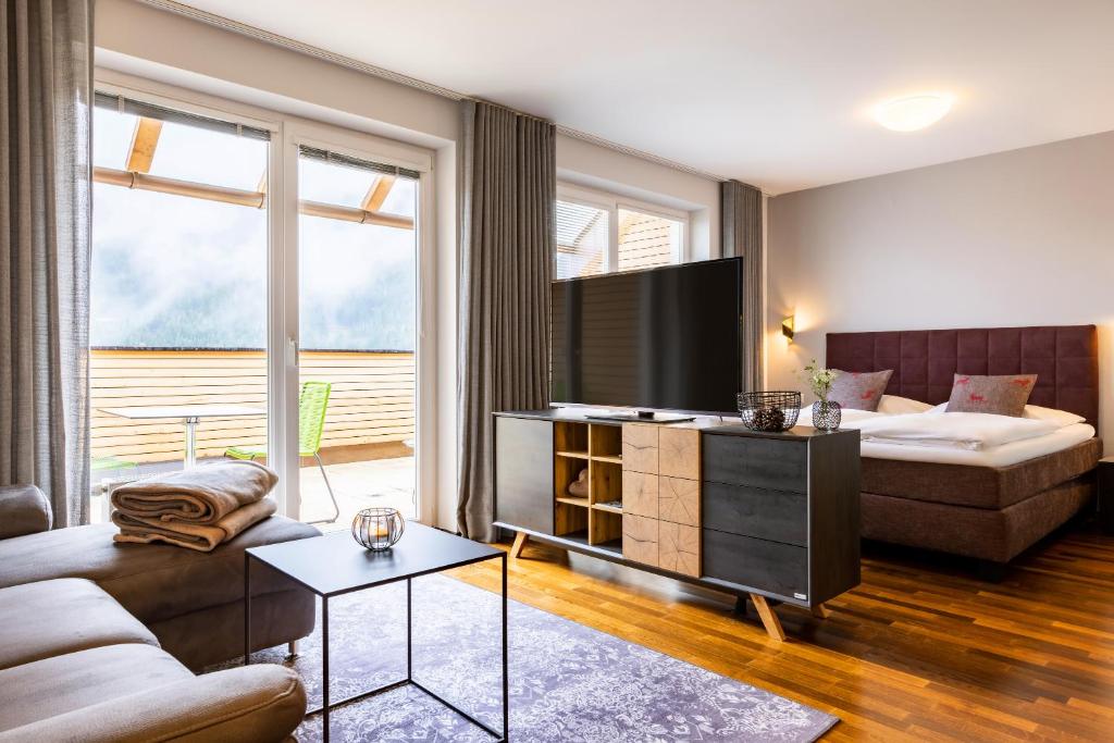 der Sonnberg Alpinlodges - Apartments mit Seeblick, privater Sauna und Self Check-In - 1