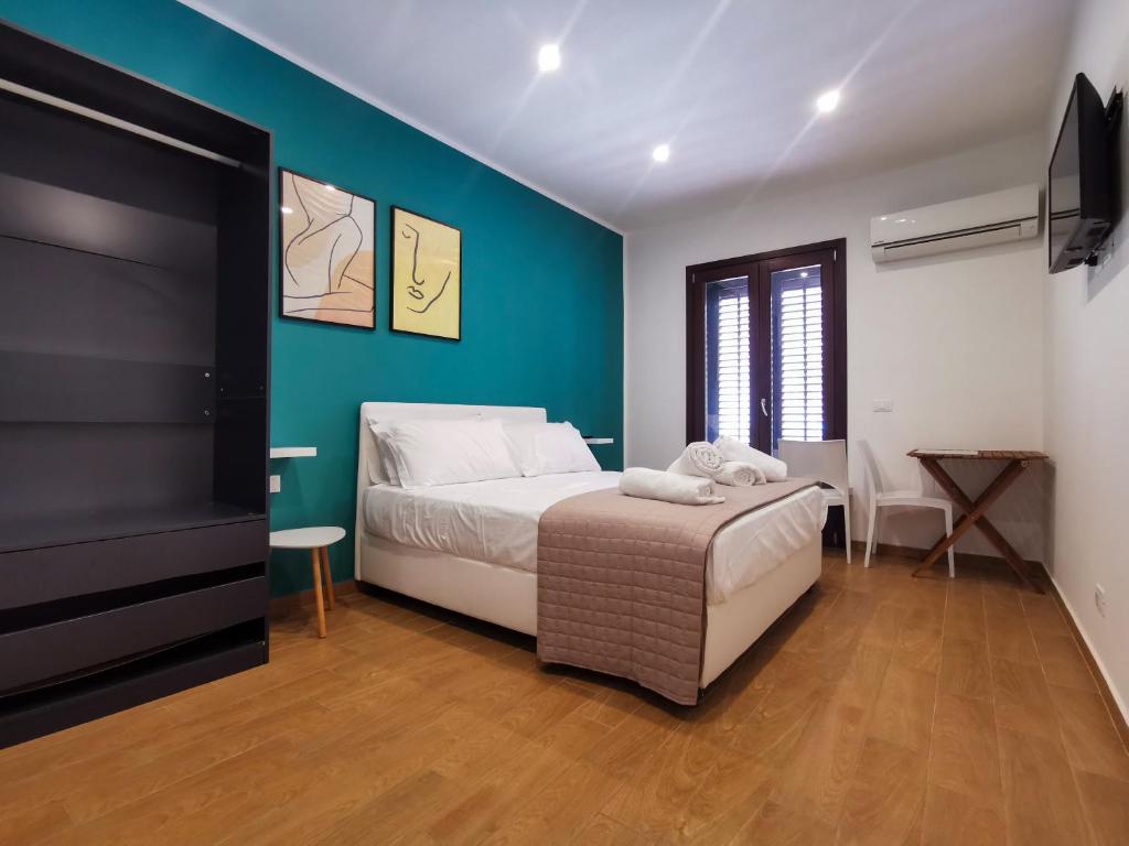 Posteľ alebo postele v izbe v ubytovaní Verdirooms158