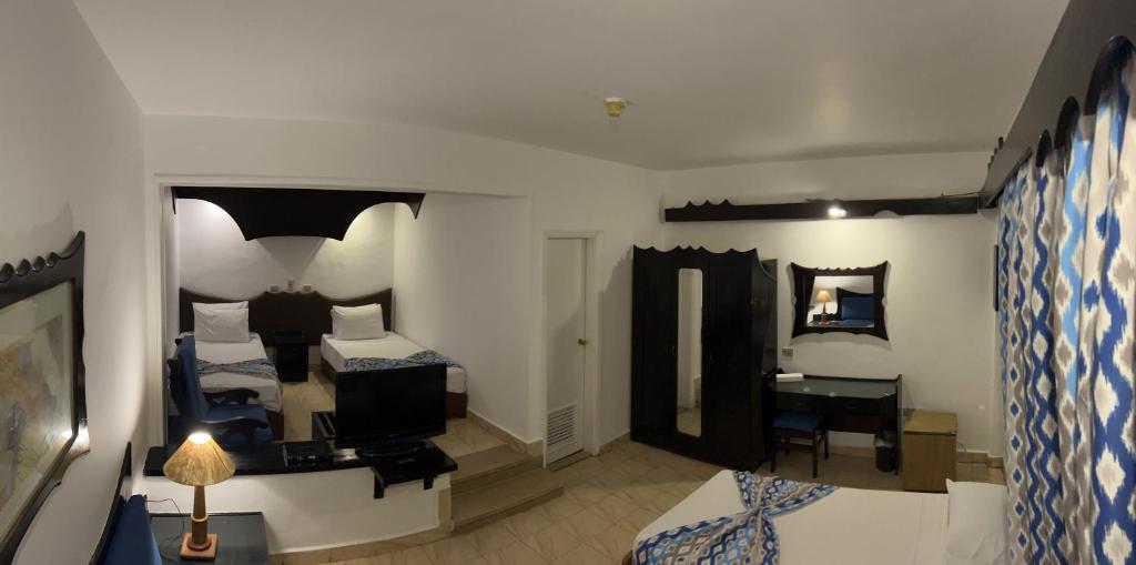 Postel nebo postele na pokoji v ubytování Aida Hotel Sharm El Sheikh