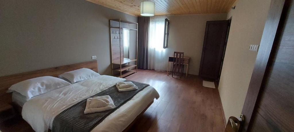 Postel nebo postele na pokoji v ubytování Mestia Views